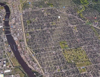 north Minneapolis overhead view of path of tornado from 2011 May 22, with white dot showing location of my house